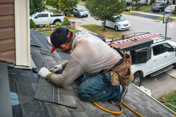 Professional Roofing technician working in Grand Junction, MI